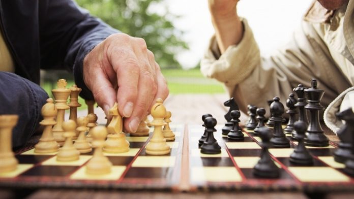 people playing chess game